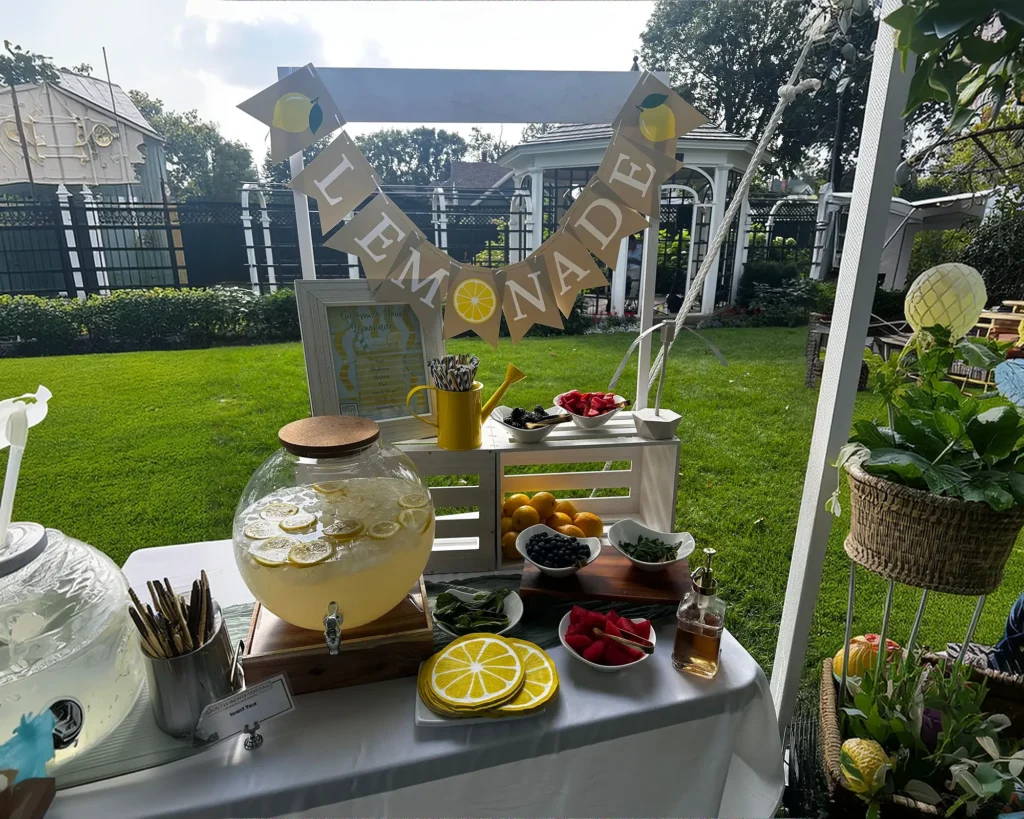 Garden drinks stand with lemonade dispensers and glasses